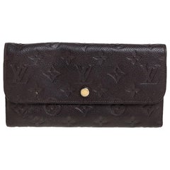 Louis Vuitton Terre Monogram Empreinte Virtuose Wallet