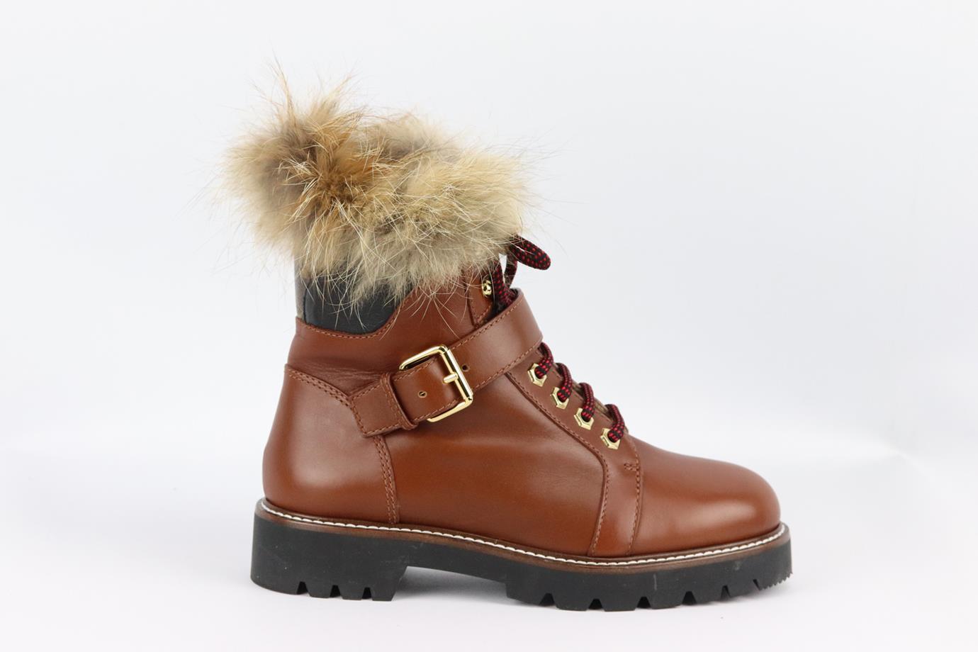 Louis Vuitton Territory Ranger fur trimmed leather ankle boots. Brown. Lace up fastening at front. Does not come with box or dustbag. Size: EU 38.5 (UK 5.5, US 8.5). Outersole: 10.5 in. Shaft: 6.4 in. Heel: 1.5 in. New without box
