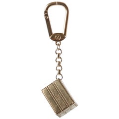 Louis Vuitton Textured Trunk Motif Gold Tone Keychain / Bag Charm