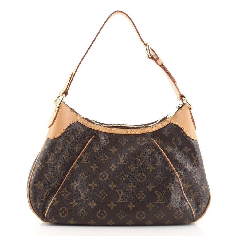 louis vuitton bag with gold plate