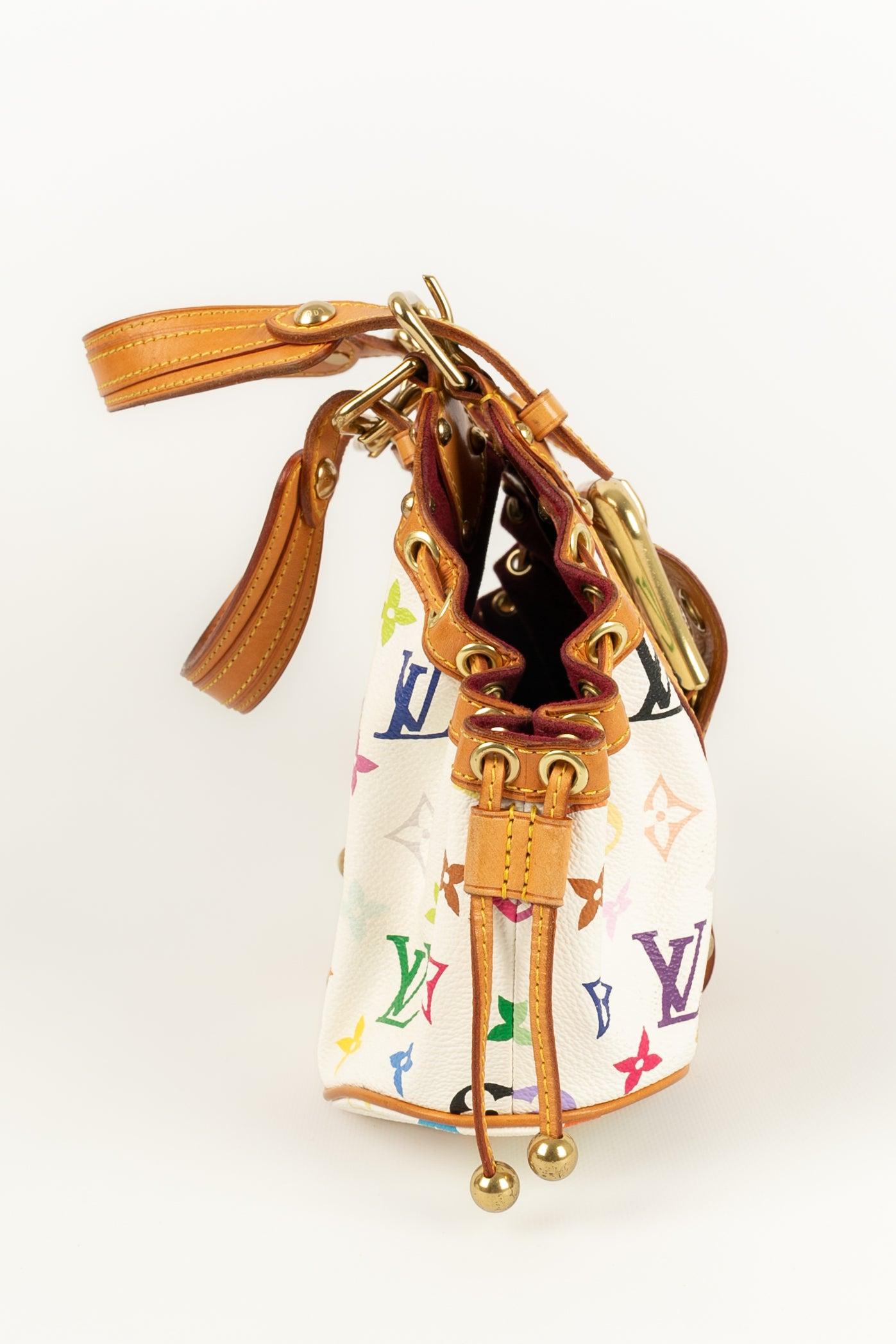Louis Vuitton - Multicolored monogrammed leather bag on white background, Theda model. Golden metal attributes.

Additional information: 
Dimensions: Length: 28 cm, Height: 20 cm, Depth: 10 cm, Handle: 35 cm
Condition: Good condition
Seller Ref