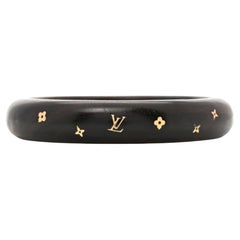 LOUIS VUITTON Pulsera Sylvania de latón y madera de tigre
