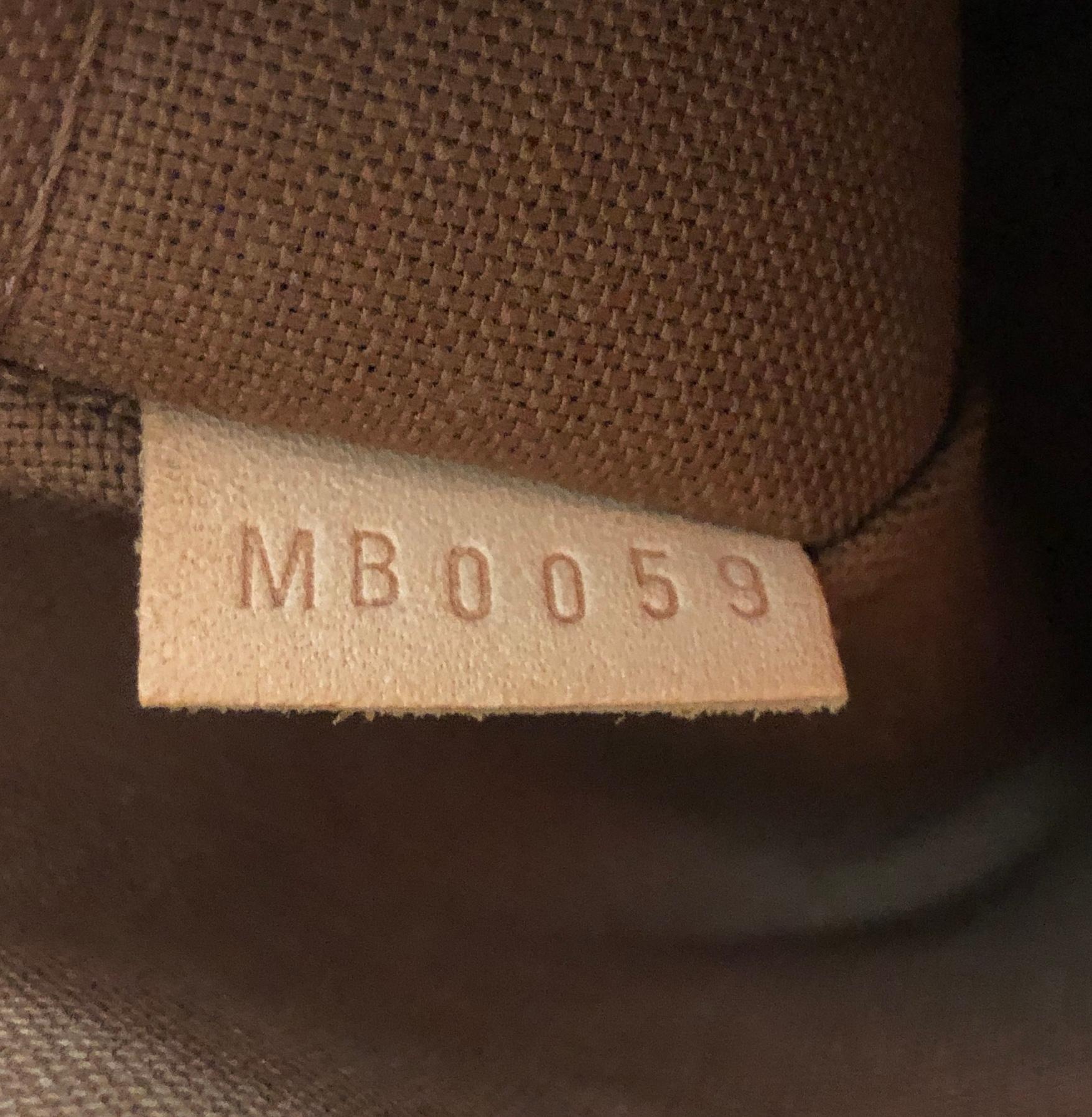 Louis Vuitton Tivoli Handbag 4