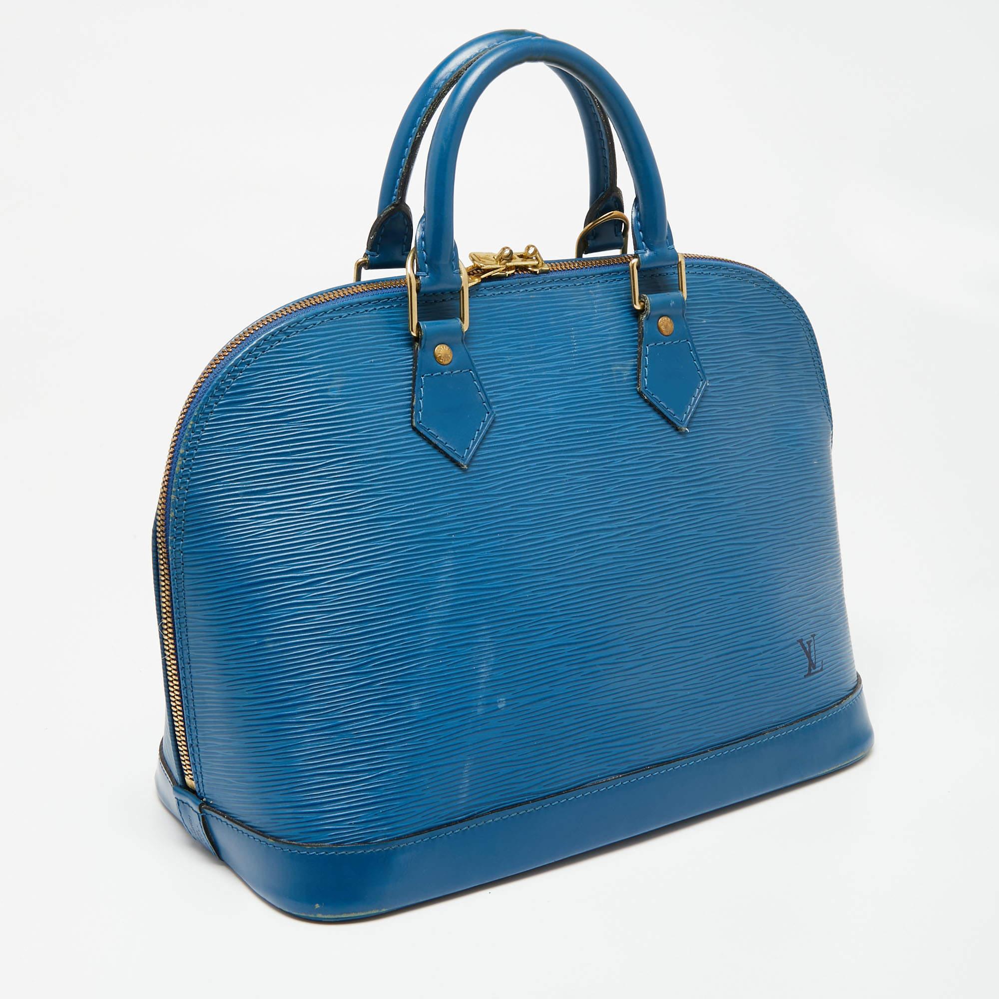 Louis Vuitton Toledo Blue Epi Leather Alma PM Bag In Fair Condition For Sale In Dubai, Al Qouz 2