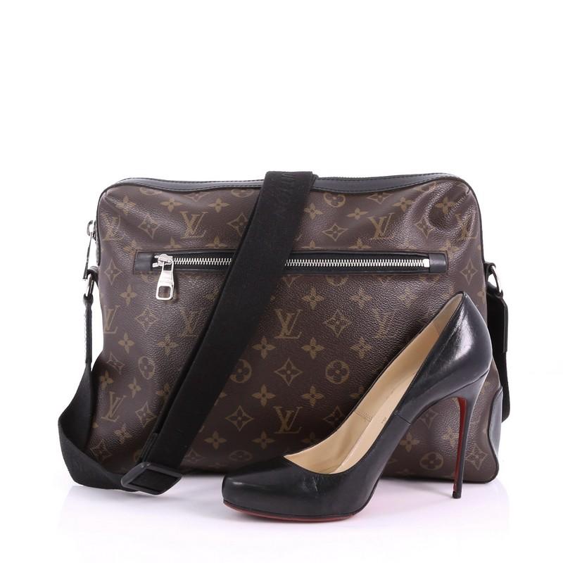 This Louis Vuitton Torres Handbag Macassar Monogram Canvas GM, crafted from brown monogram coated canvas, features an adjustable canvas strap, front zip pocket, and silver-tone hardware. Its zip closure opens to a burgundy fabric interior with slip