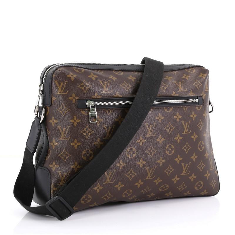 This Louis Vuitton Torres Handbag Macassar Monogram Canvas GM, crafted from brown monogram coated canvas, features an adjustable strap, front zip pocket, leather trim and silver-tone hardware. Its top zip closure opens to a red fabric interior slip