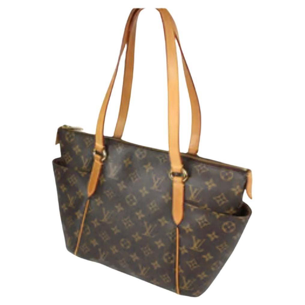 The Monogram Totally PM Bag is among the newest totes from Louis Vuitton and looks particularly striking in Monogram. It features a large yet lightweight design with an extra spacious interior and two large side pockets. This versatile tote is