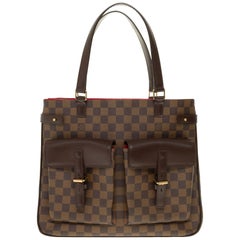 Woman with Brown Checkered Louis Vuitton Bag before Diesel Black