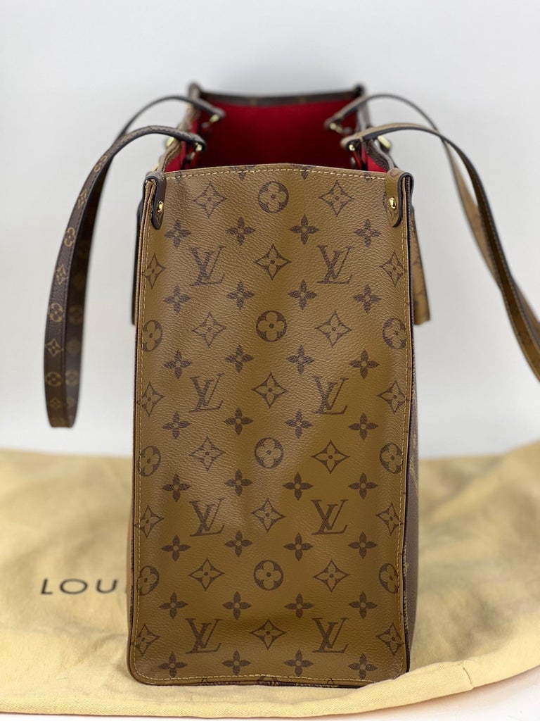 Louis Vuitton Carry It Monogram Reverse Video Print Brown in Coated  Canvas/Cowhide Leather with Gold-tone - US