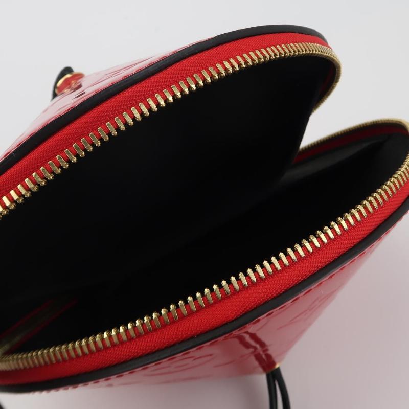 Louis Vuitton Toupie Sac à bandoulière en cuir verni rouge Pour femmes en vente