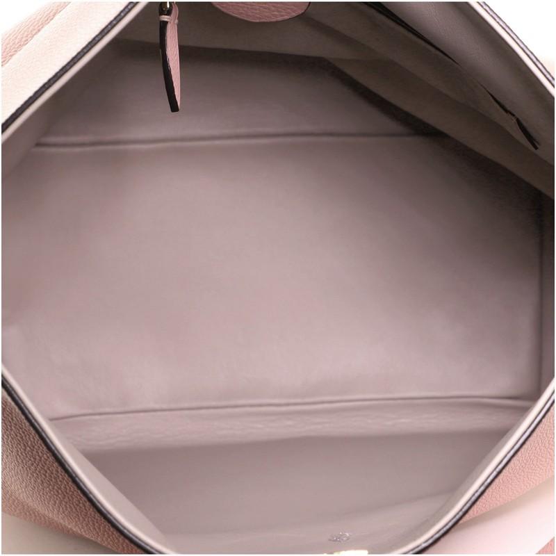 Louis Vuitton Tournon Handbag Leather In Good Condition In NY, NY