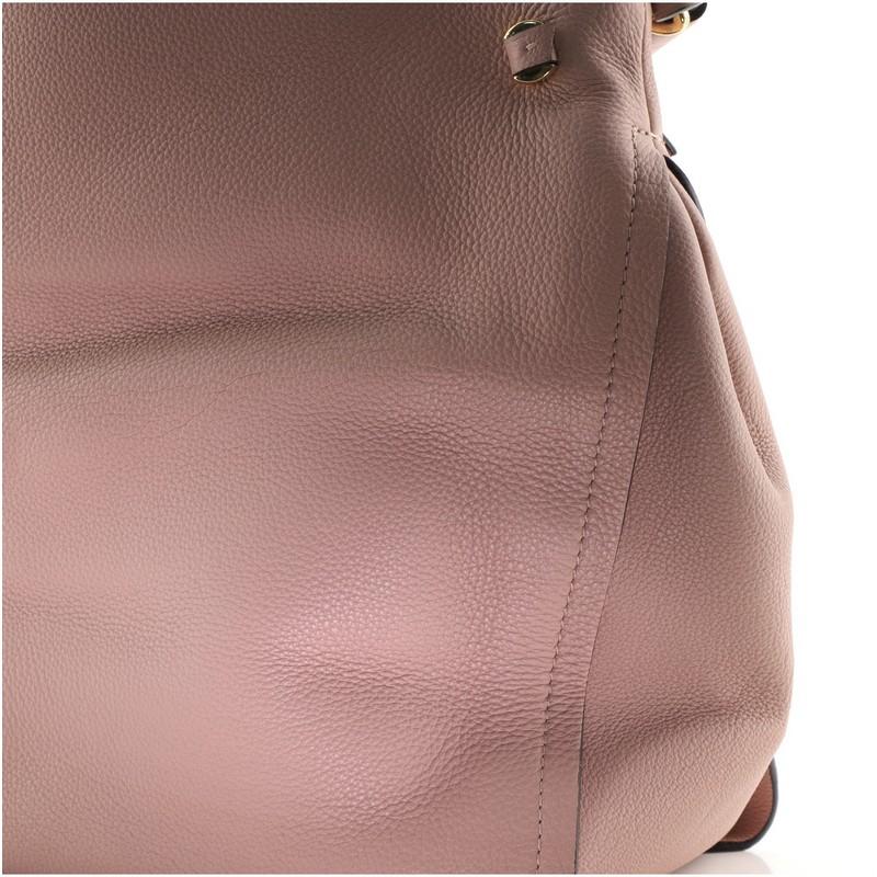 Women's or Men's Louis Vuitton Tournon Handbag Leather