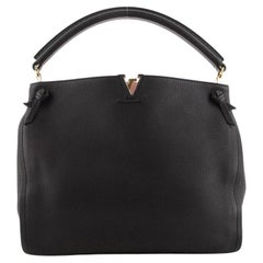 Louis Vuitton Tournon Handbag Leather