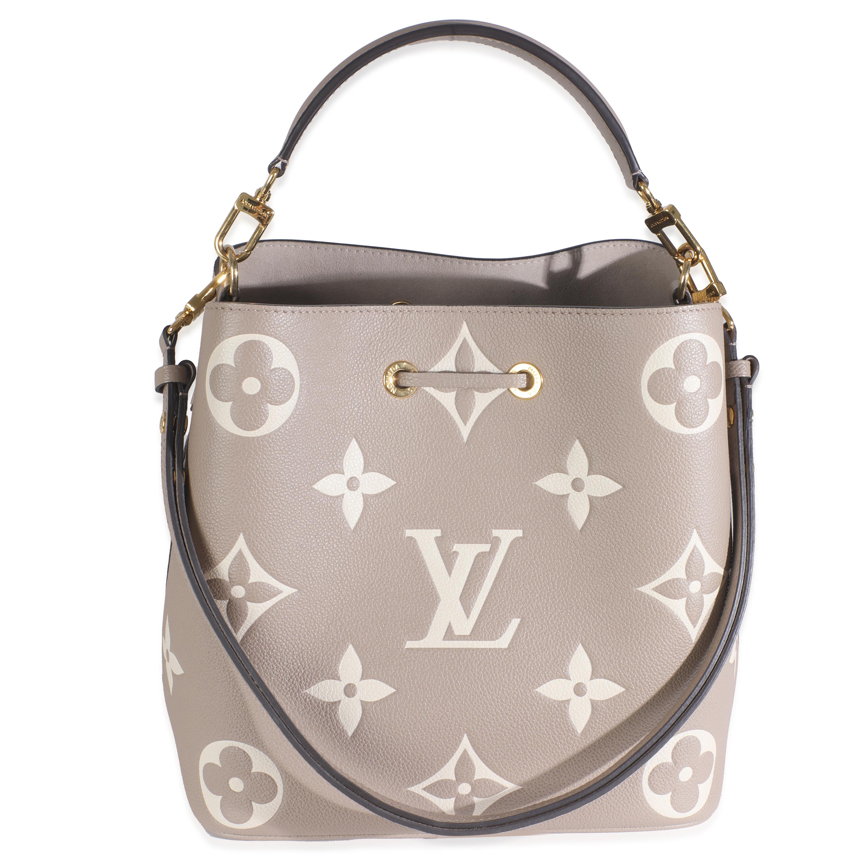 Listing Title: Louis Vuitton Tourterelle Creme Empreinte Monogram Giant Neonoe MM
SKU: Z145490
MSRP: 2900.00 USD
Condition: Pre-owned 
Handbag Condition: Excellent
Condition Comments: Item is in excellent condition and displays light signs of wear.