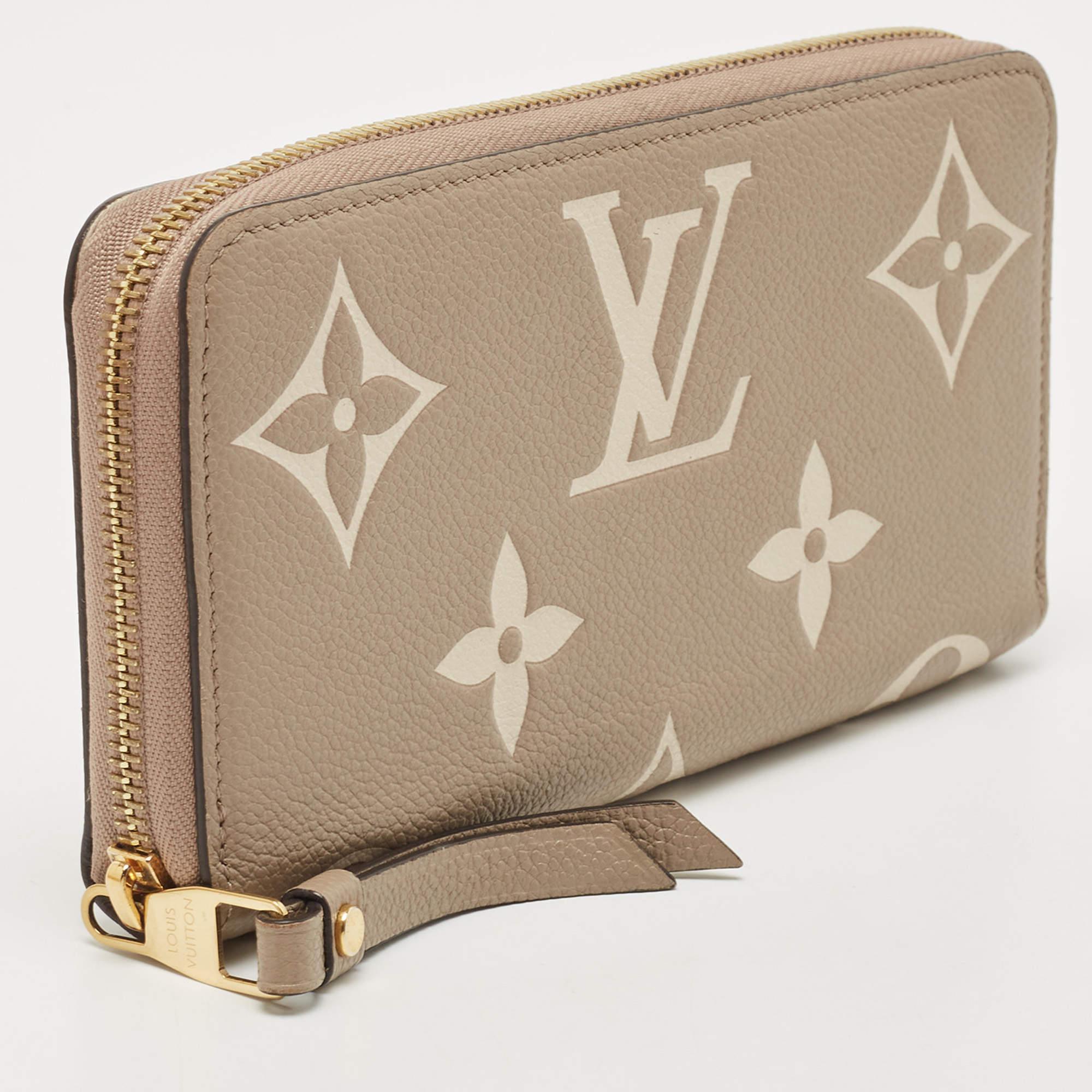 This wallet from Louis Vuitton brings along a touch of luxury and immense style. It comes crafted from Monogram Empreinte leather and is secured by a zipper.

Includes: Original Dustbag, Original Box

