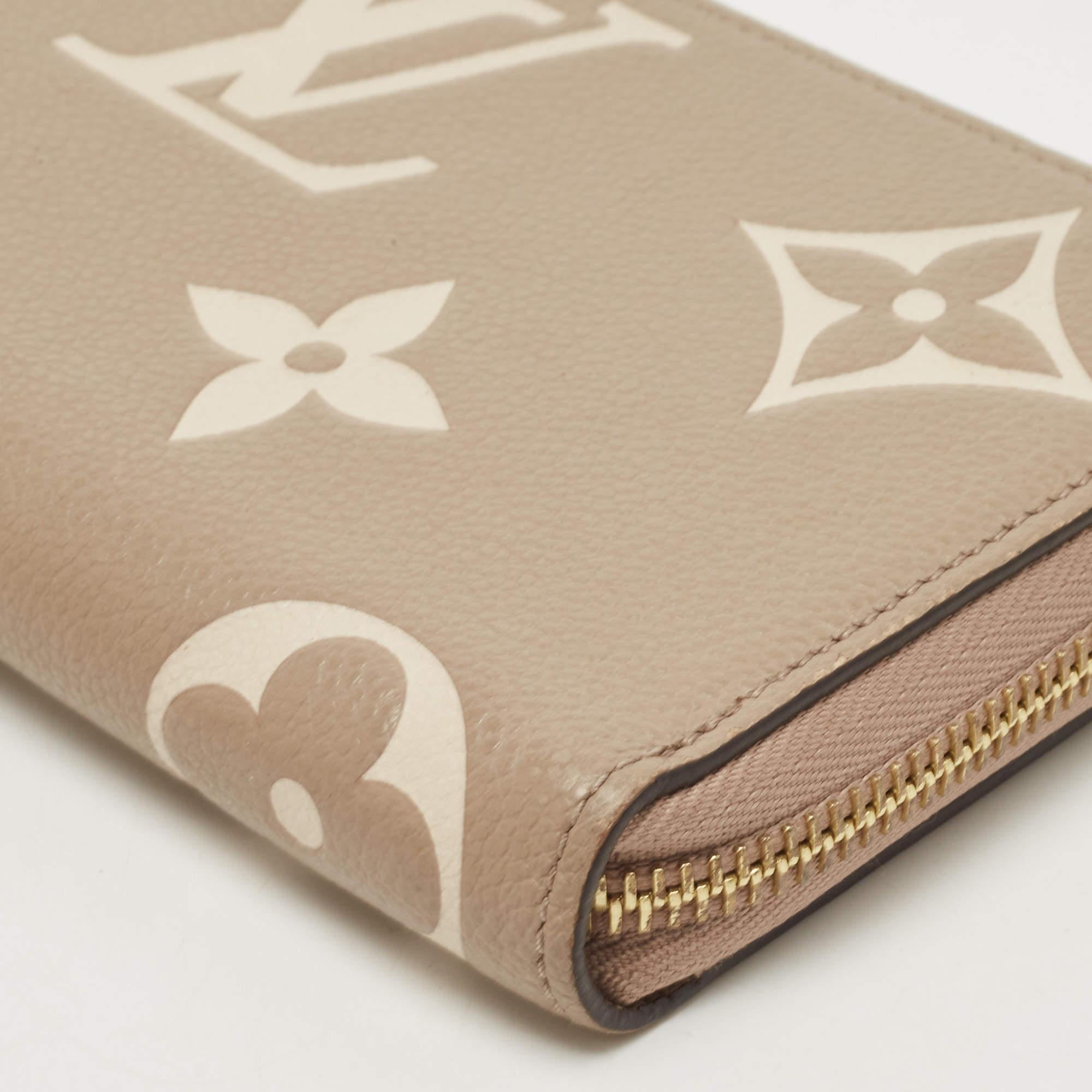 Women's Louis Vuitton Tourterelle/Creme Monogram Empreinte Leather Zippy Wallet
