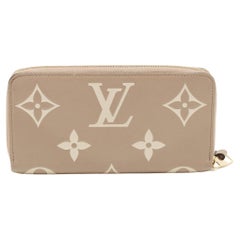 Louis Vuitton Tourterelle/Creme Monogram Empreinte Leather Zippy Wallet