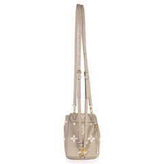 Louis Vuitton Tourterelle Empreinte Giant Monogram Tiny Backpack