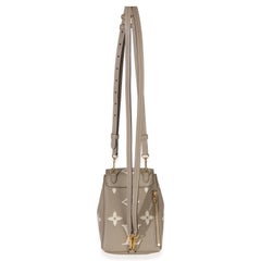 Louis Vuitton Tourterelle Empreinte Giant Monogram Tiny Backpack