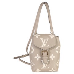 Louis Vuitton Tourterelle Empreinte Giant Monogram Tiny Backpack
