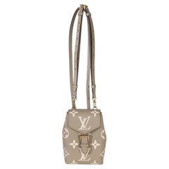 Louis Vuitton Tourterelle Empreinte Giant Monogram Tiny Backpack