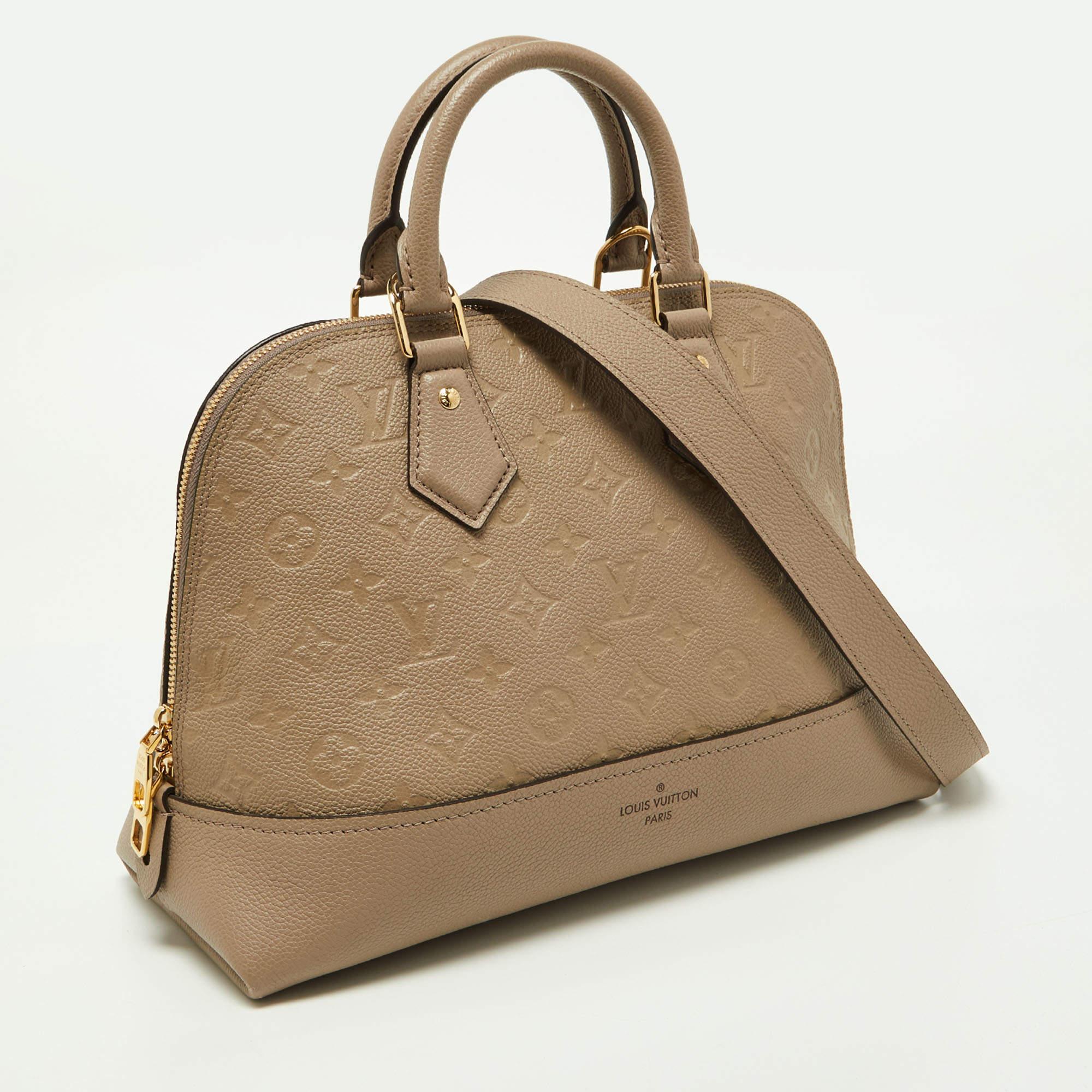 Louis Vuitton Tourterelle Monogram Empreinte Leather Neo Alma PM Bag In Good Condition In Dubai, Al Qouz 2