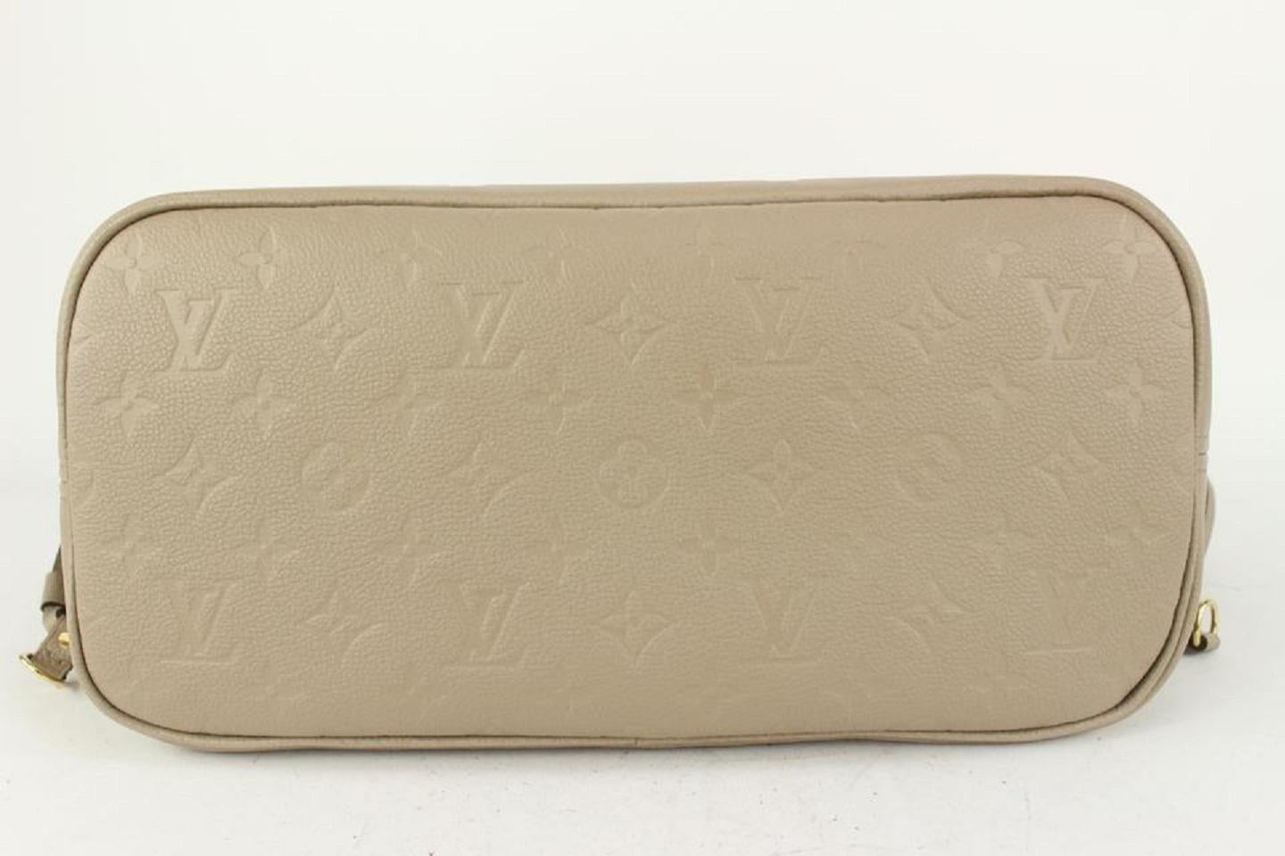 Louis Vuitton Tourterelle Monogram Giant Empreinte Leather Neverfull MM Tote  In New Condition For Sale In Dix hills, NY