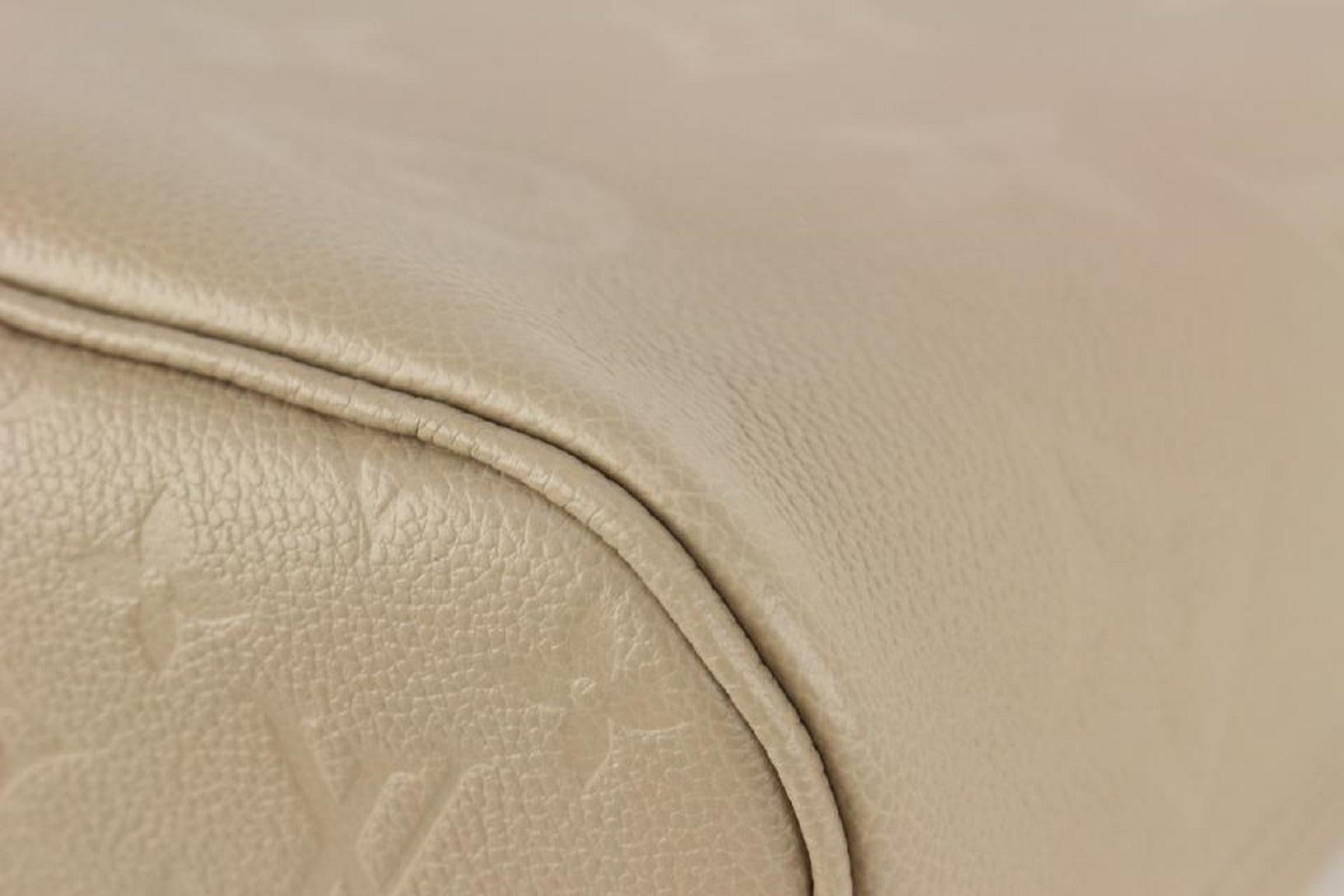 Louis Vuitton Tourterelle Monogram Giant Empreinte Leather Neverfull MM Tote 1