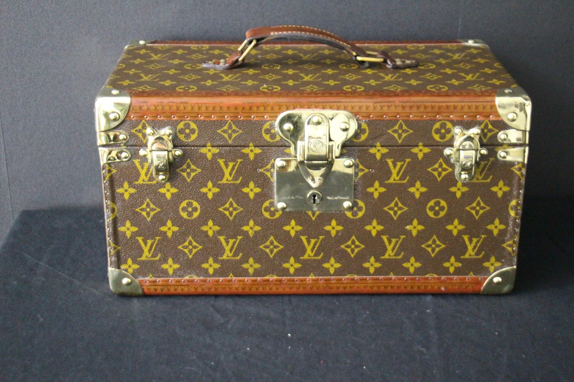 This Louis Vuitton beauty case features monogram canvas and all brass fittings, brass lock, brass clasps and brass corners.
All studs are marked Louis Vuitton as well as its top leather handle. All its trim is printed with Louis Vuitton monogram but