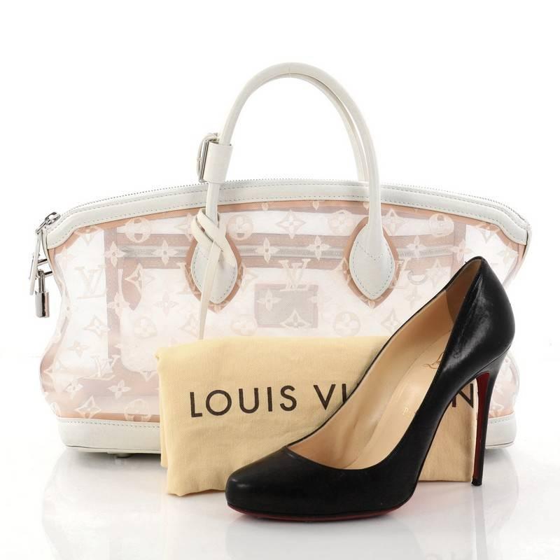 This authentic Louis Vuitton Transparence Lockit Handbag Mesh and Leather East West is a chic and timeless piece perfect for day or evening excursions. Crafted from lovely monogram stitched transparent mesh with white leather trims, this bag
