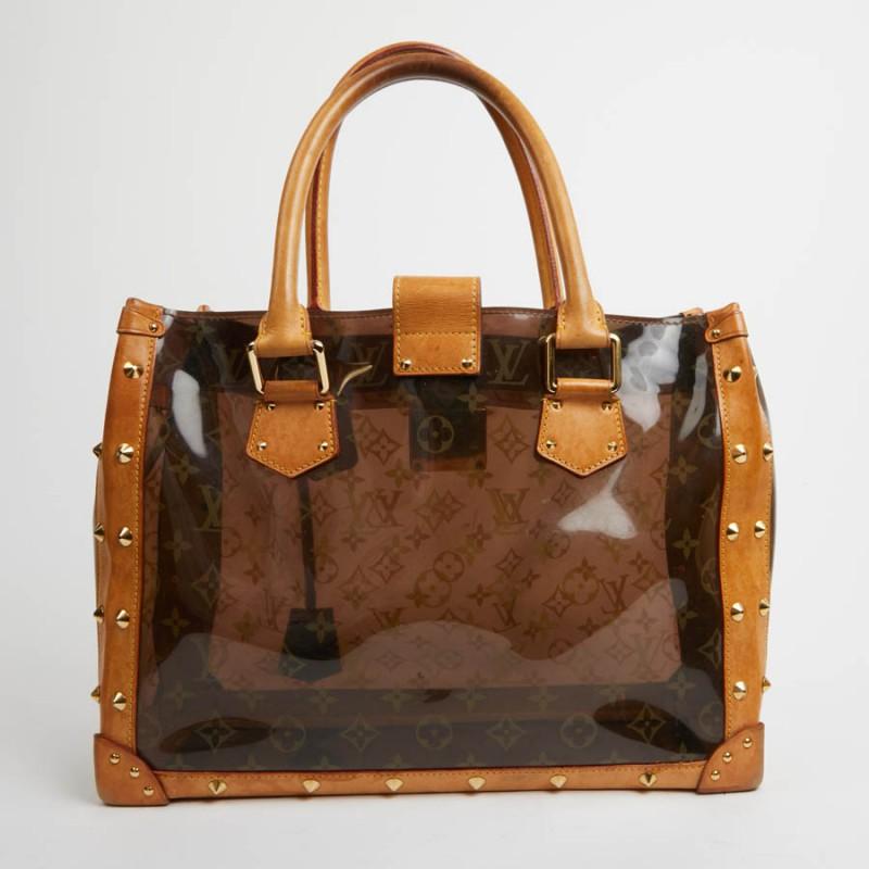 Rare item. This limited edition Croisière Ambre Noé, from Maison VUITTON combines originality and know-how. The details remind us of the Maison's trunks, with studded rivets, the stamped clasp, the bell and its key. The shopping bag is in