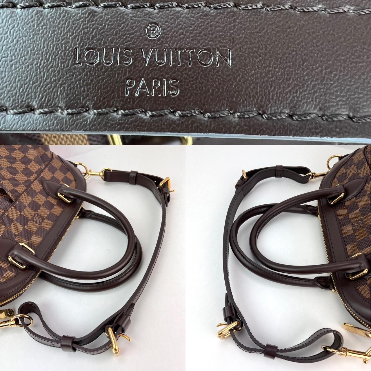 Pre-Owned  100% Authentic

Louis Vuitton Trevi PM Damier Ebene Canvas Shoulder Hand Bag
RATING: A...excellent, near mint has little to no signs
of use
MATERIAL: damier ebene canvas, leather trim
STRAP: LV removable adjusdtable brown leather strap