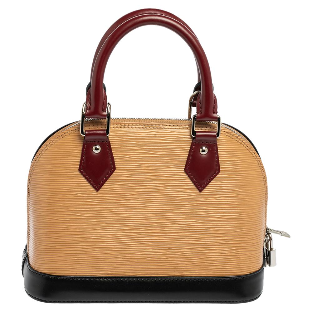 Out of all the irresistible handbags from Louis Vuitton, the Alma is the most structured one. First introduced in 1934 by Gaston-Louis Vuitton, the Alma is a classic that has received love from fashion icons. This piece comes crafted from Epi