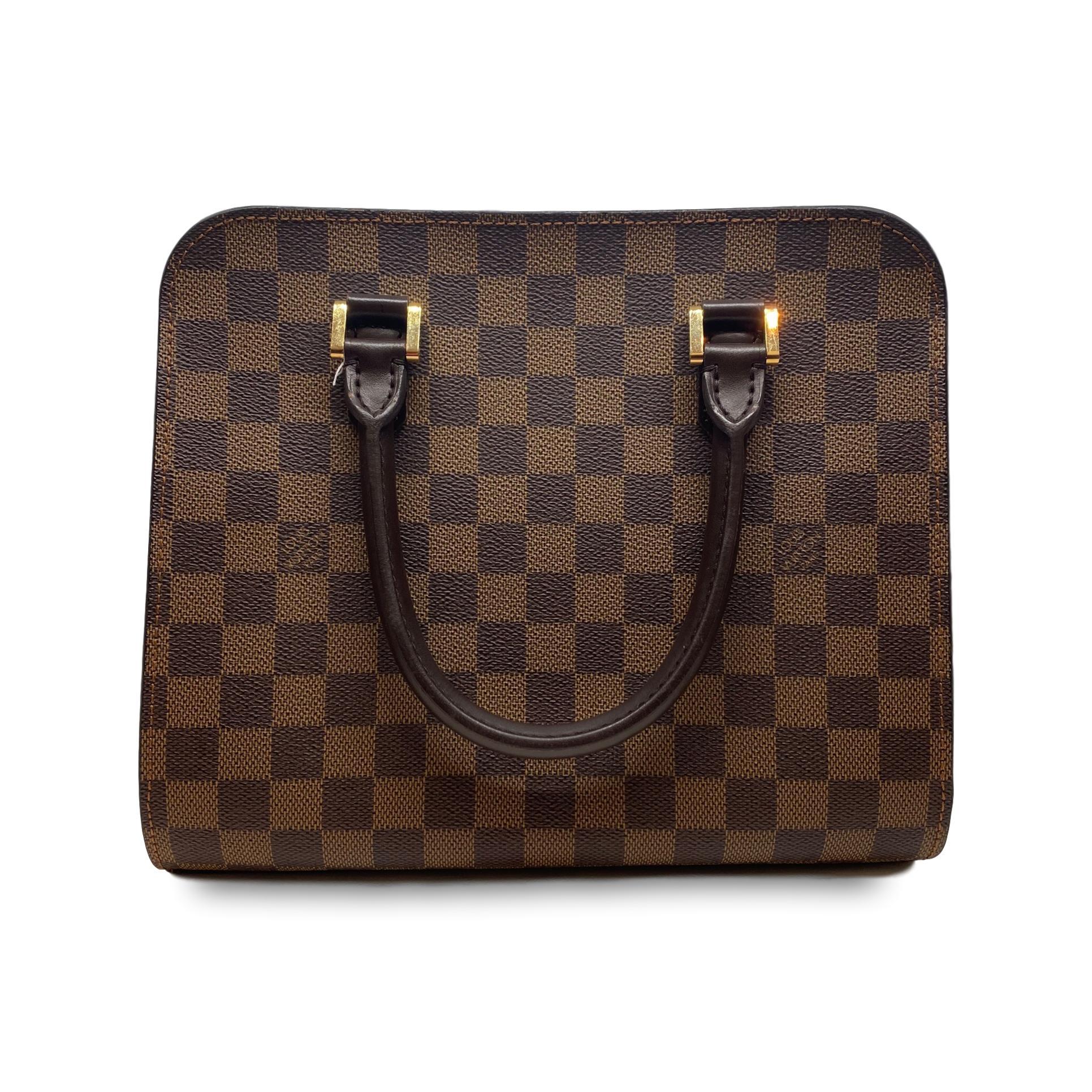 The Louis Vuitton Triana Top Handle Handbag is a rare sized and sought after collection bag. The perfect transitional bag from day to night, the Triana is roomy and elegant in the beautiful Damier canvas. Originally created in 1888, Louis Vuitton