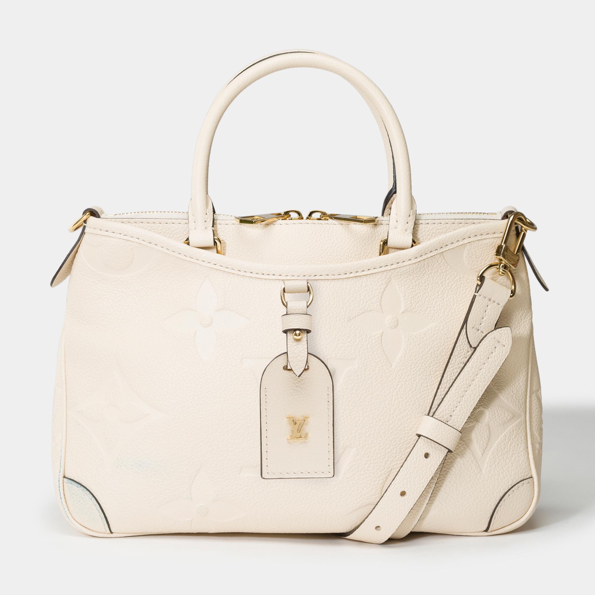 Featuring​ ​a​ ​more​ ​compact​ ​size​ ​and​ ​multiple​ ​zippered​ ​compartments,​ ​this​ ​Trianon​ ​PM​ ​bag​ ​in​ ​embossed​ ​Monogram​ ​Empreinte​ ​leather​ ​is​ ​the​ ​perfect​ ​alternative​ ​to​ ​the​ ​traditional​ ​tote.​ ​Its​ ​V-shaped​