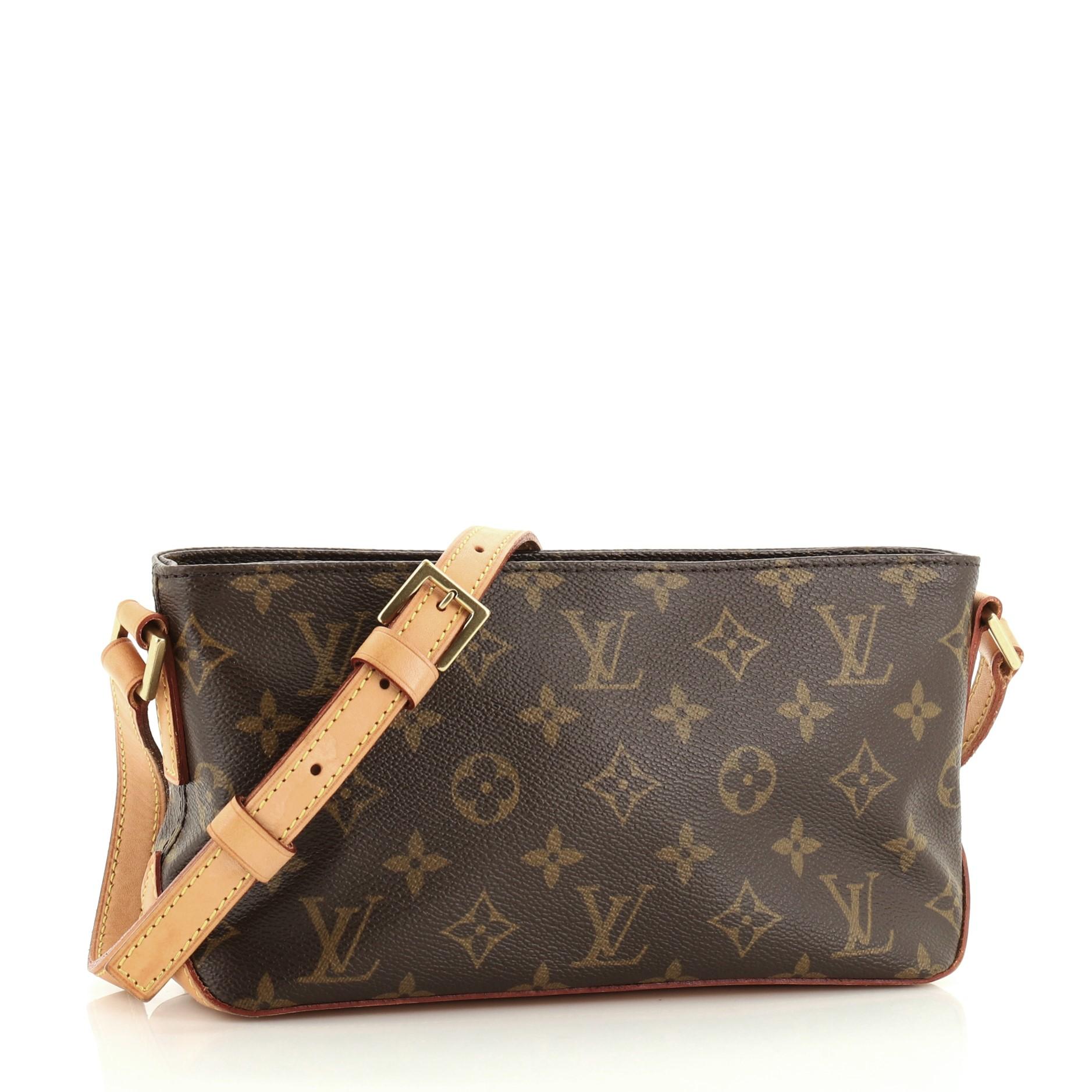 Condition: Very good. Creasing on exterior, moderate wear, darkening, scuffs and watermarks on base, leather trims and strap. Minor wear and small stains in interior, scratches and tarnish on hardware. 
Accessories: No Accessories 
Measurements: