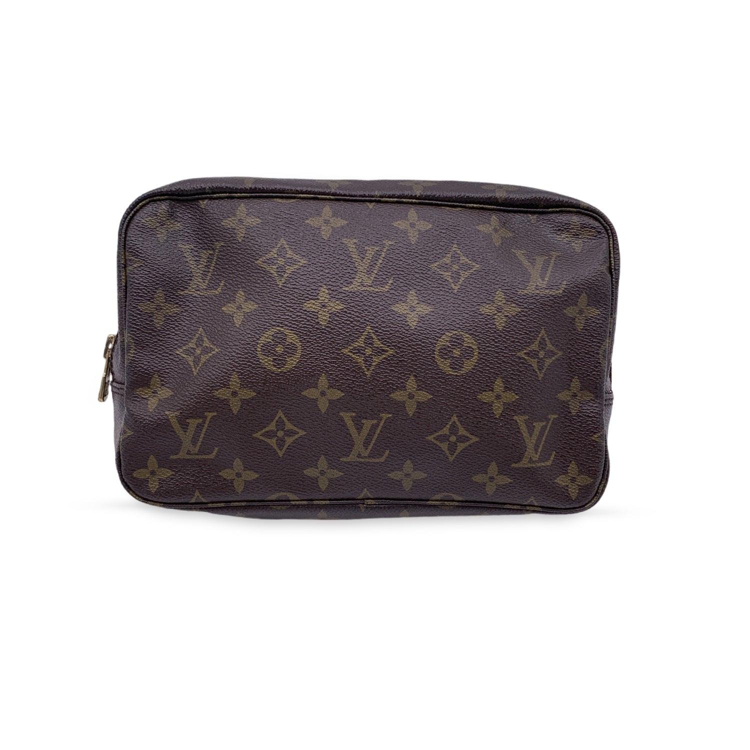 LOUIS VUITTON Paris - Made in France' tag inside. Data code engraved inside (TH 8901). Condition A - EXCELLENT Gently used. As seen in pictures. Details MATERIAL: Cloth COLOR: Brown MODEL: Trousse de Toilette GENDER: Unisex Adults COUNTRY OF