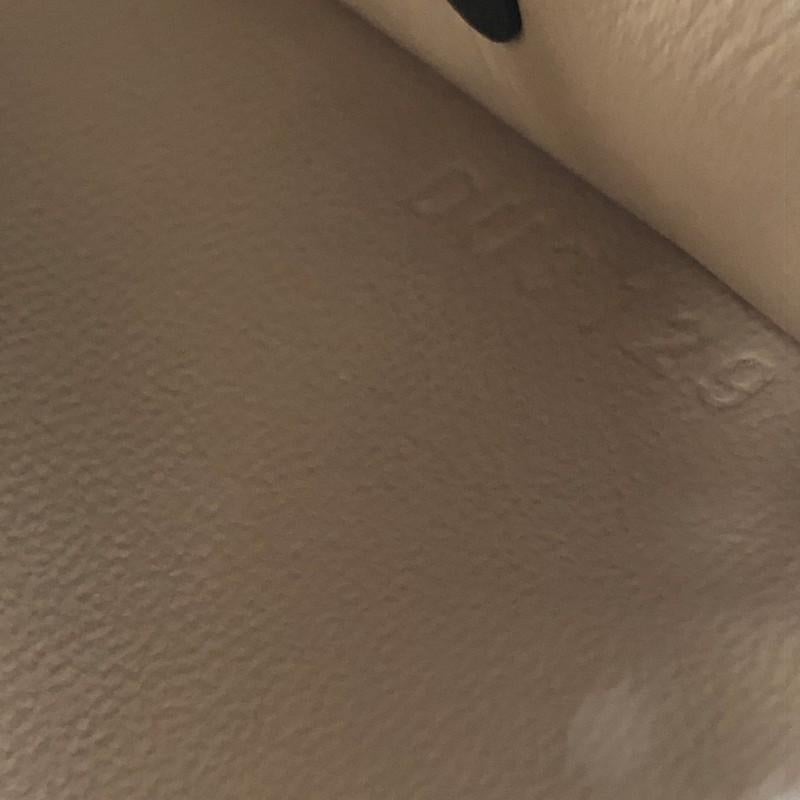 Women's or Men's Louis Vuitton Trunk Clutch Reverse Monogram Canvas