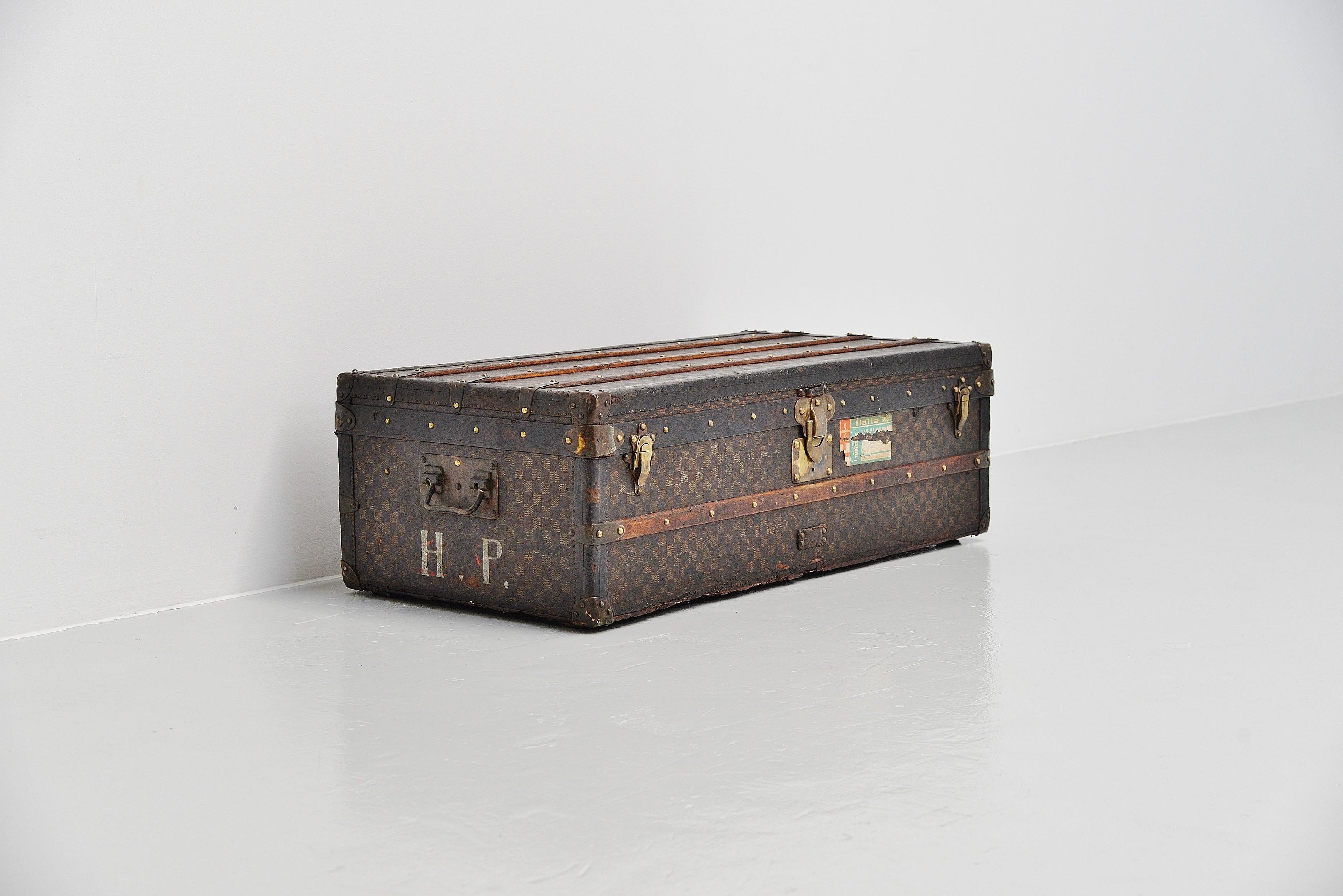 From the collection of Savineti we offer this very rare Louis Vuitton Damier Trunk:
-	Brand: Louis Vuitton
-	Model: Damier Trunk 
-	Year: 1910-1914
-	Condition: Good (for its age, used); some losses on the sides and underside -> please have a close