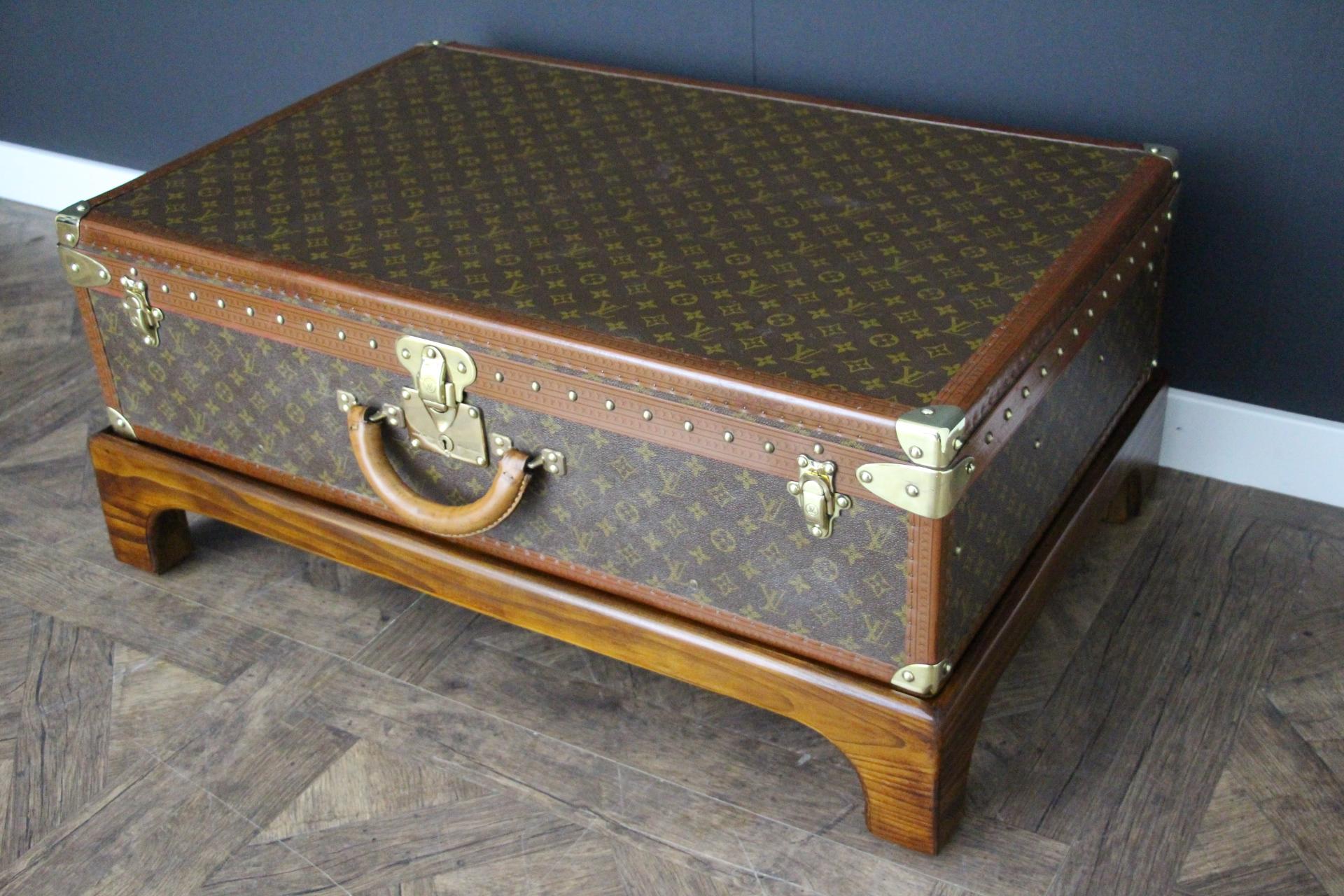 Magnificent Louis Vuitton Alzer monogramm suitcase. This 80 cm suitcase is the largest and the most luxury one made by Louis Vuitton. All Louis Vuitton stamped solid brass fittings: locks, clasps and studs. It comes with its original LV leather name