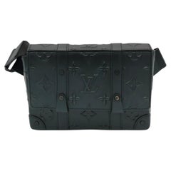 Louis Vuitton Trunk Monogram Seal Black Slingbag - '20s