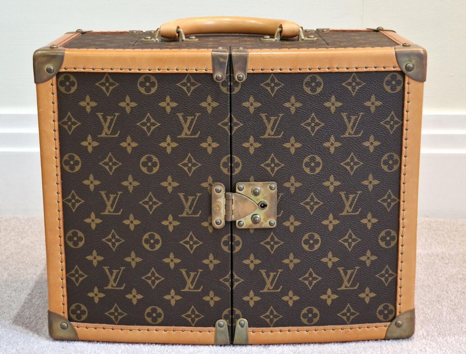 A unique and exceptional piece for collectors and fashion connoisseurs, the Louis Vuitton Limited Edition Monogram Canvas Amfar Sharon Stone Trunk combines high fashion with a noble cause. This rare and limited edition trunk was designed by the