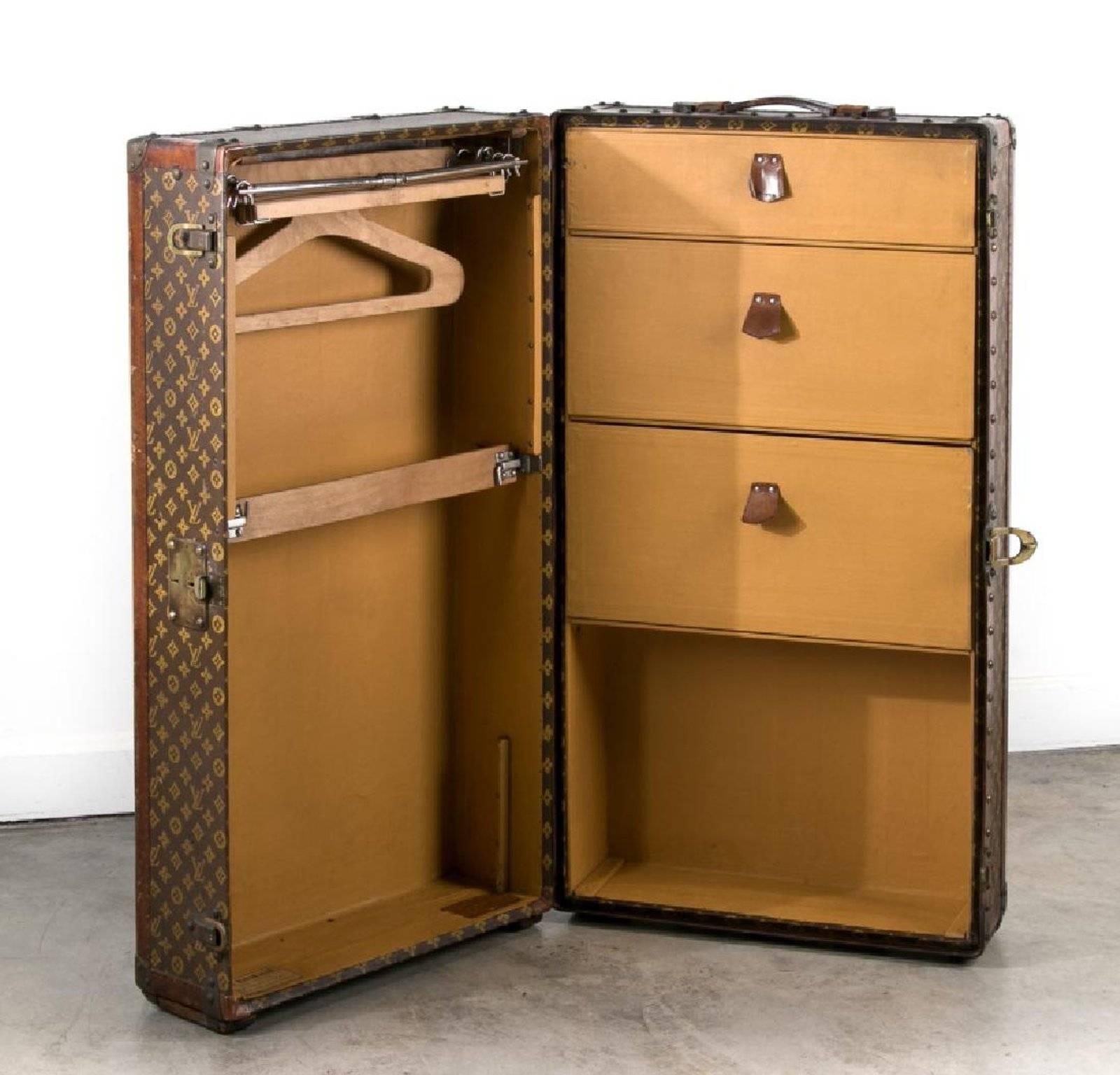 Louis Vuitton, early 20th century
Vintage steamer wardrobe trunk, the interior fitted with drawers and hangers
Brass lock on front stamped 