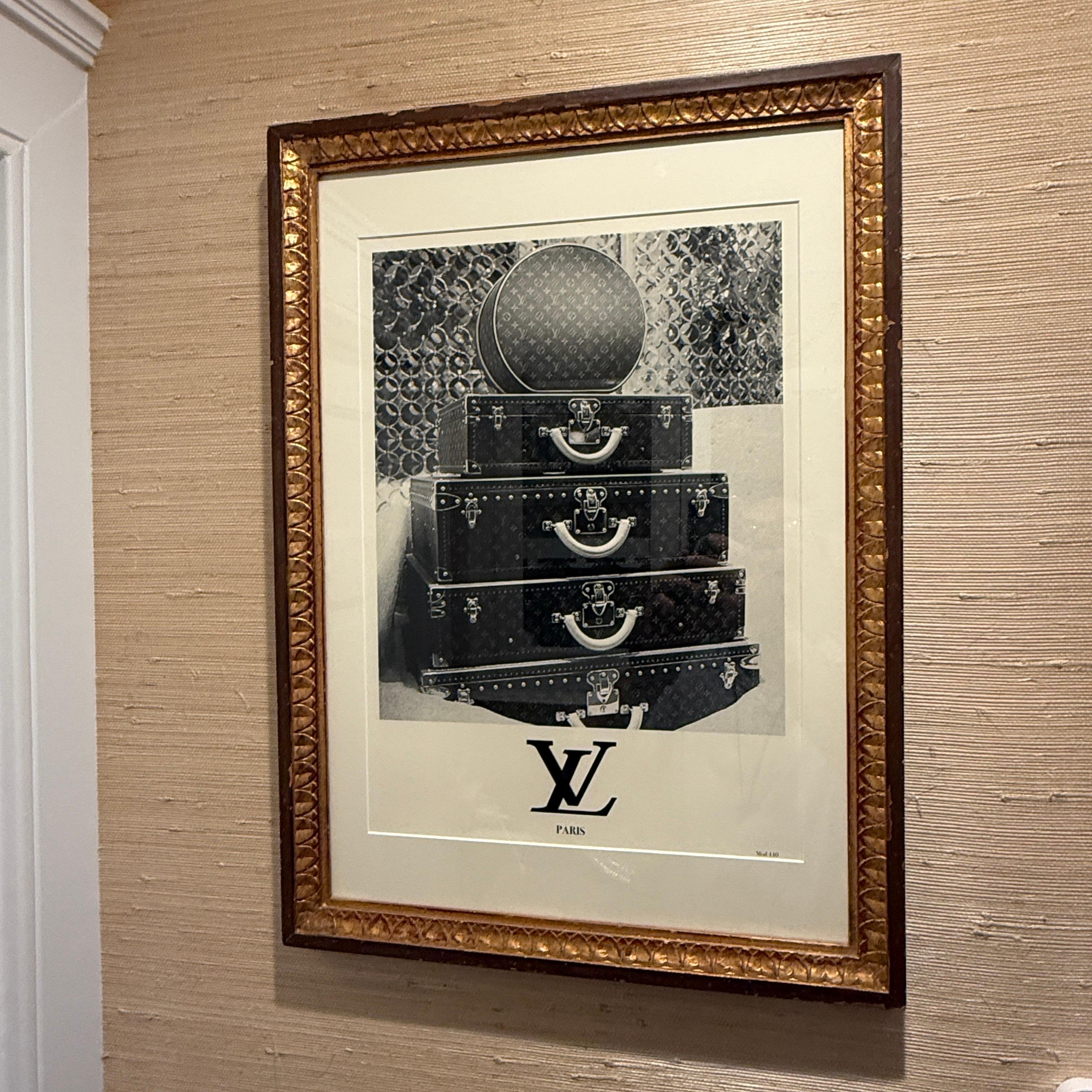 Louis Vuitton Print from Paris, France framed in a vintage wooden Gold Leaf frame. The artwork features the iconic Louis Vuitton suitcases artistically stacked. Similar piece can be seen in retail store in Paris, France. Great piece of art for an LV