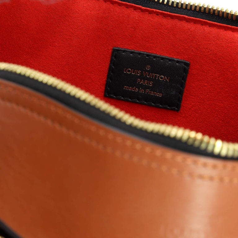 Louis Vuitton Tuileries Monogram Canvas Handbag - OneLuxury