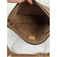 Louis Vuitton Tulum Canvas in Ochre