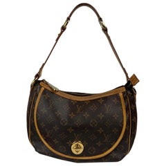 Louis Vuitton Tulum Canvas in Ochre