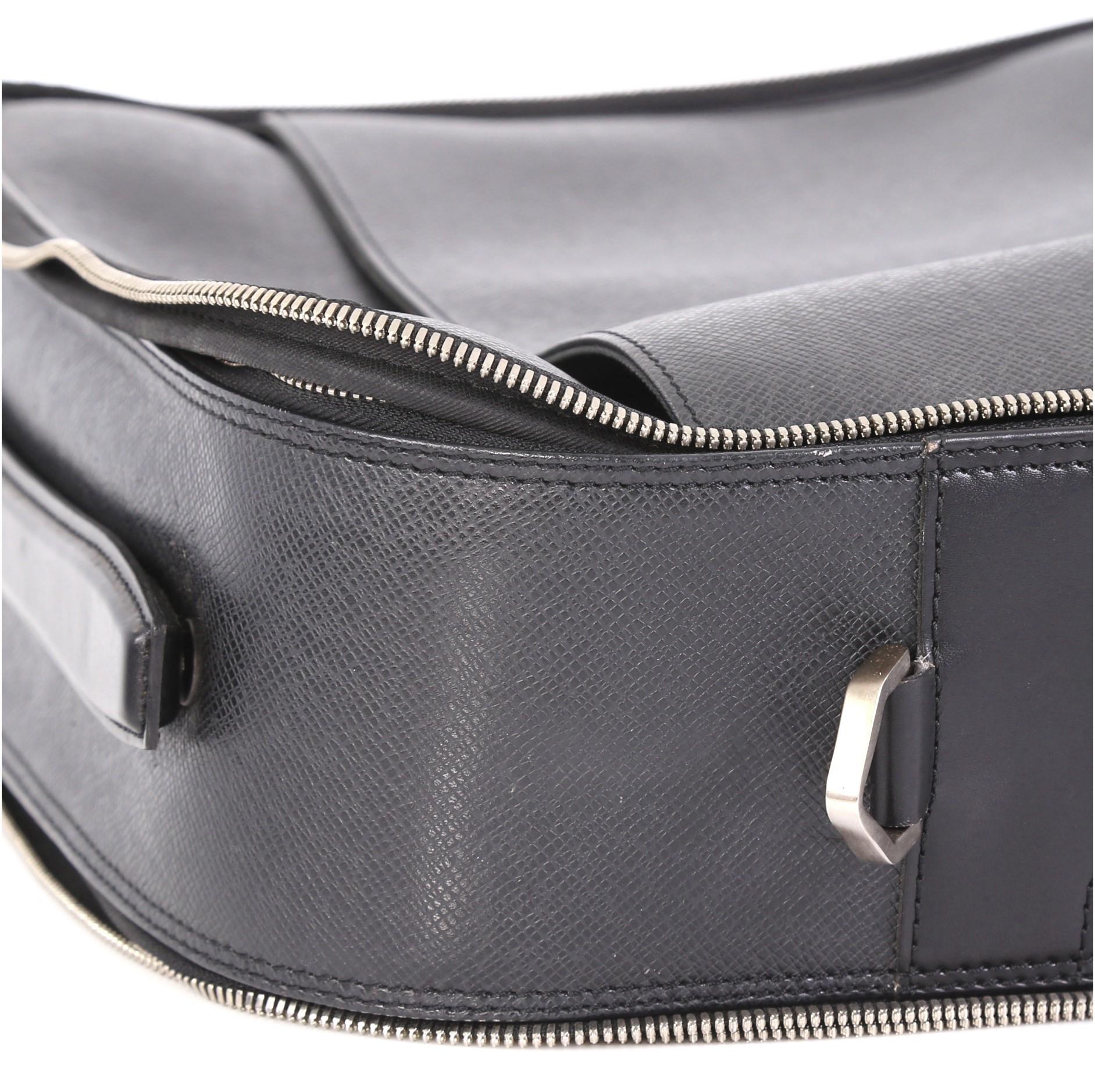 Louis Vuitton Tura Messenger Bag Taiga Leather 1
