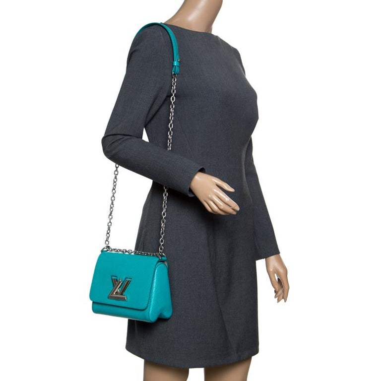 Louis Vuitton Turquoise Epi Leather Twist PM Bag For Sale at 1stDibs  louis  vuitton turquoise bag, lv turquoise bag, turquoise louis vuitton bag