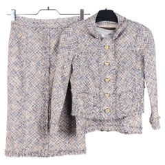 Louis Vuitton tweed suit with a skirt and top